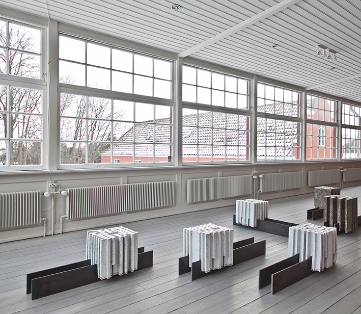 The Displacements exhibition at Grimmerhus reimagined space with glazed concrete, exploring tension, form, and material dialogue in a historic setting. 5