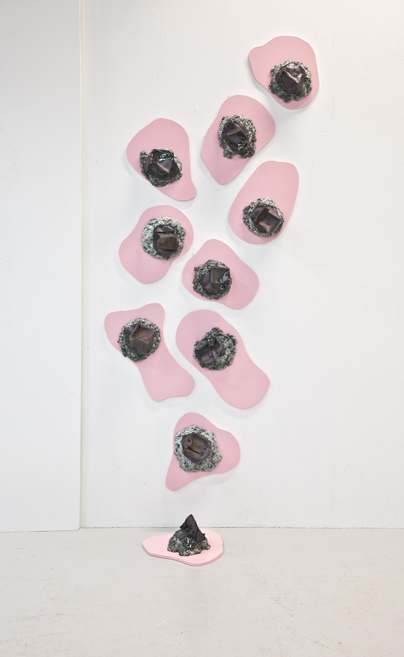 Ceramic installations inspired by childhood soapbox cars, exploring time, memory, and space at Gallery 21 in Malmö. 14